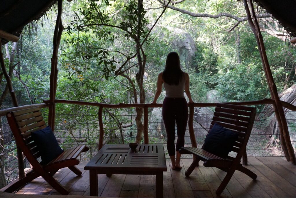 Admiring the green jungle views from the treehouse