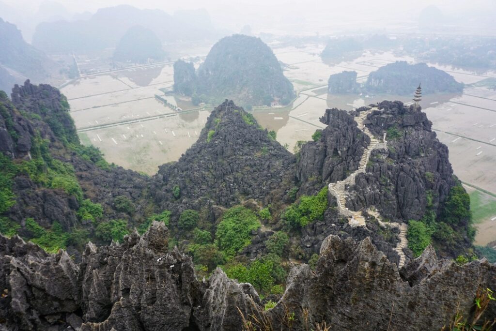 There's a 360 degree view of the surrounding rice fields and villages from the top of Hang Mua peak. 