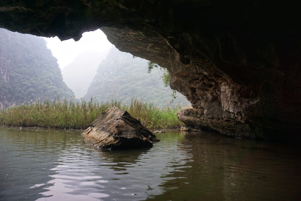 Going through a cave on the Tam Coc boat tour
