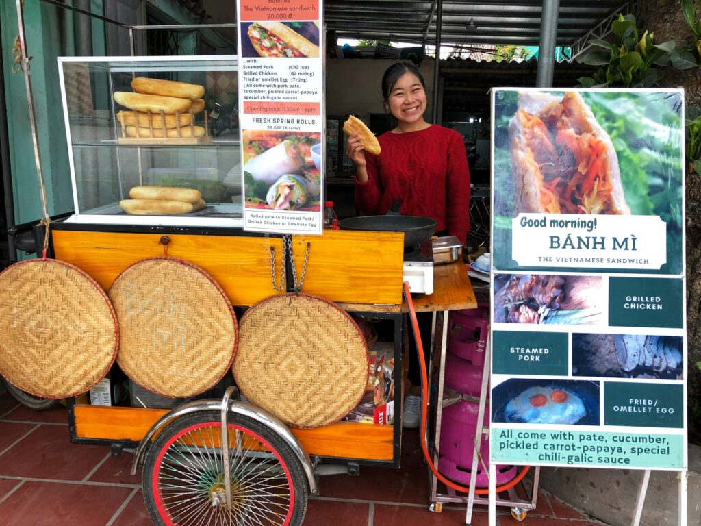 A food stand selling banh mi sandwiches