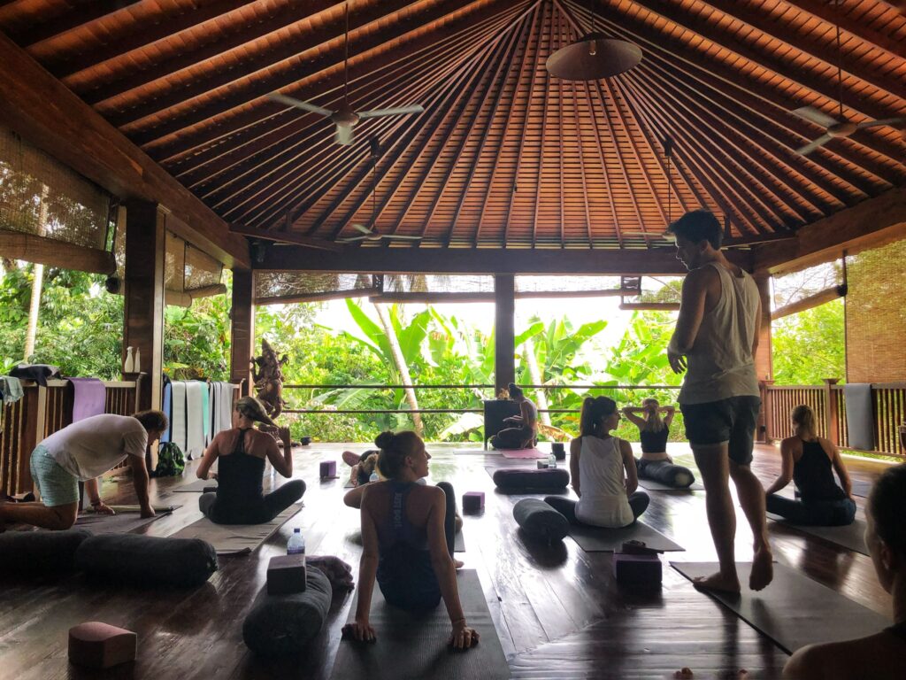 Taking a yoga class at Sri Yoga Shala