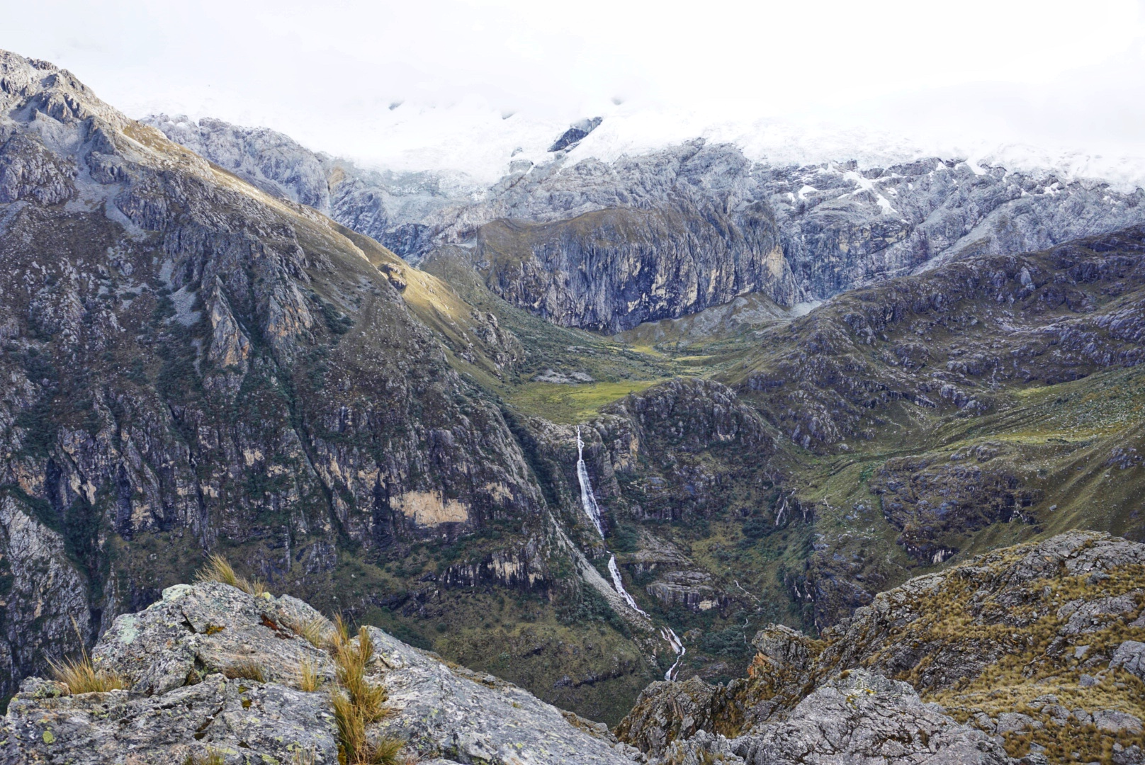 The trail has views of waterfalls and towering mountain peaks all around you.