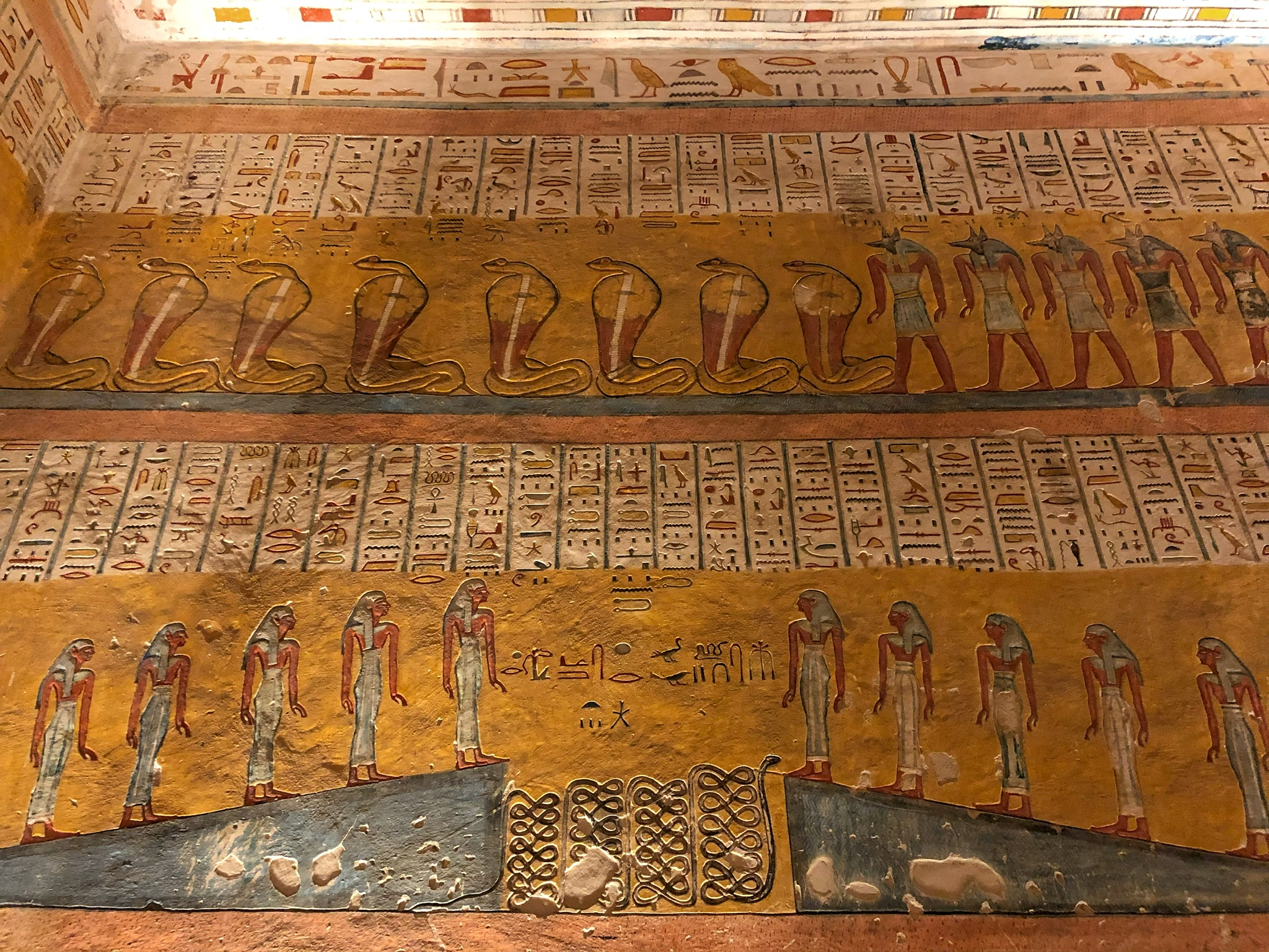 Colorful hieroglyphs inside a tomb at Valley of the Kings