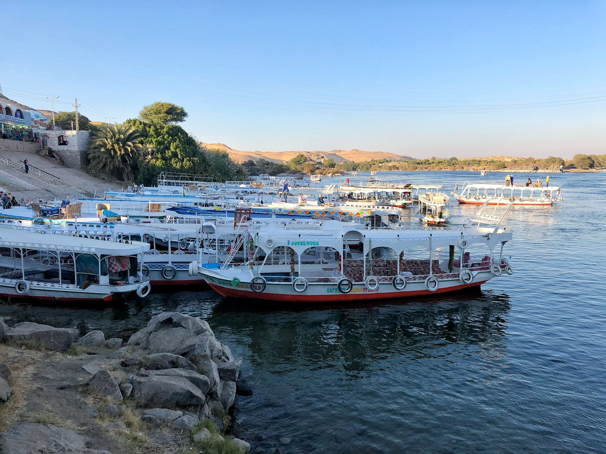 Boats docked at the entrance to the Nubian Village from the Nile River