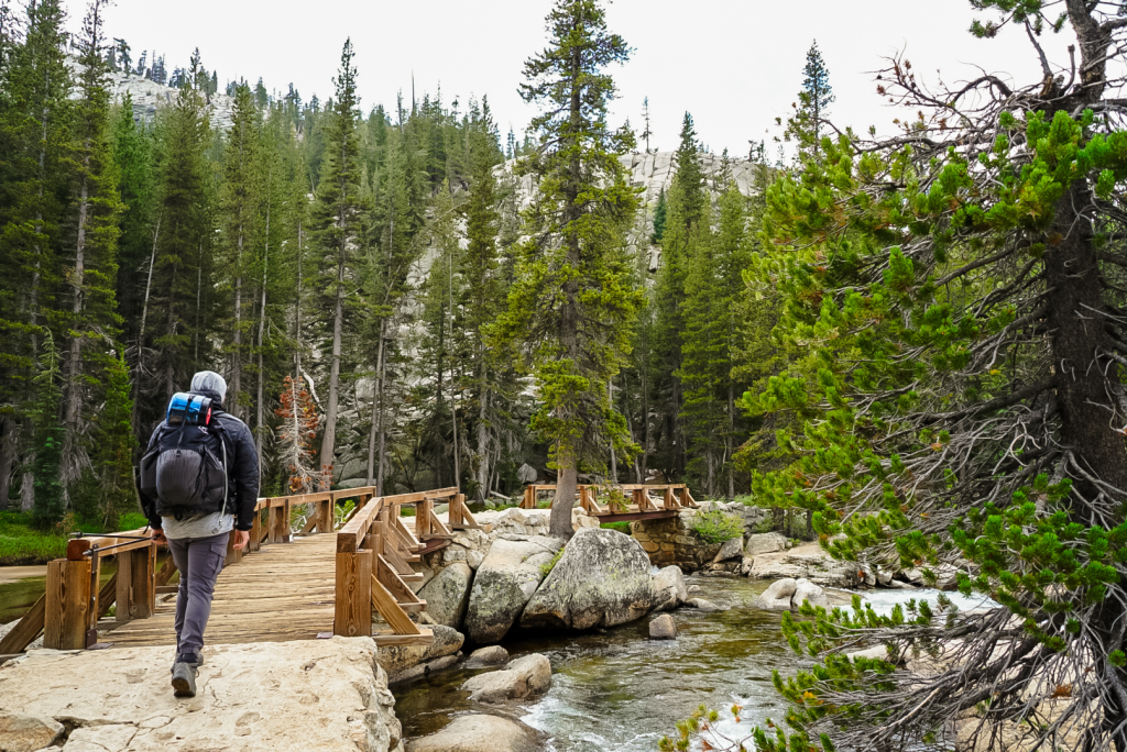 Crossing a bridge along the Glen Aulin trail, Yosemite